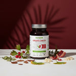 Suplement Biowen Cardiovita Complex+ 90 kapsułek otoczony owocami głogu, granatu, liśćmi.