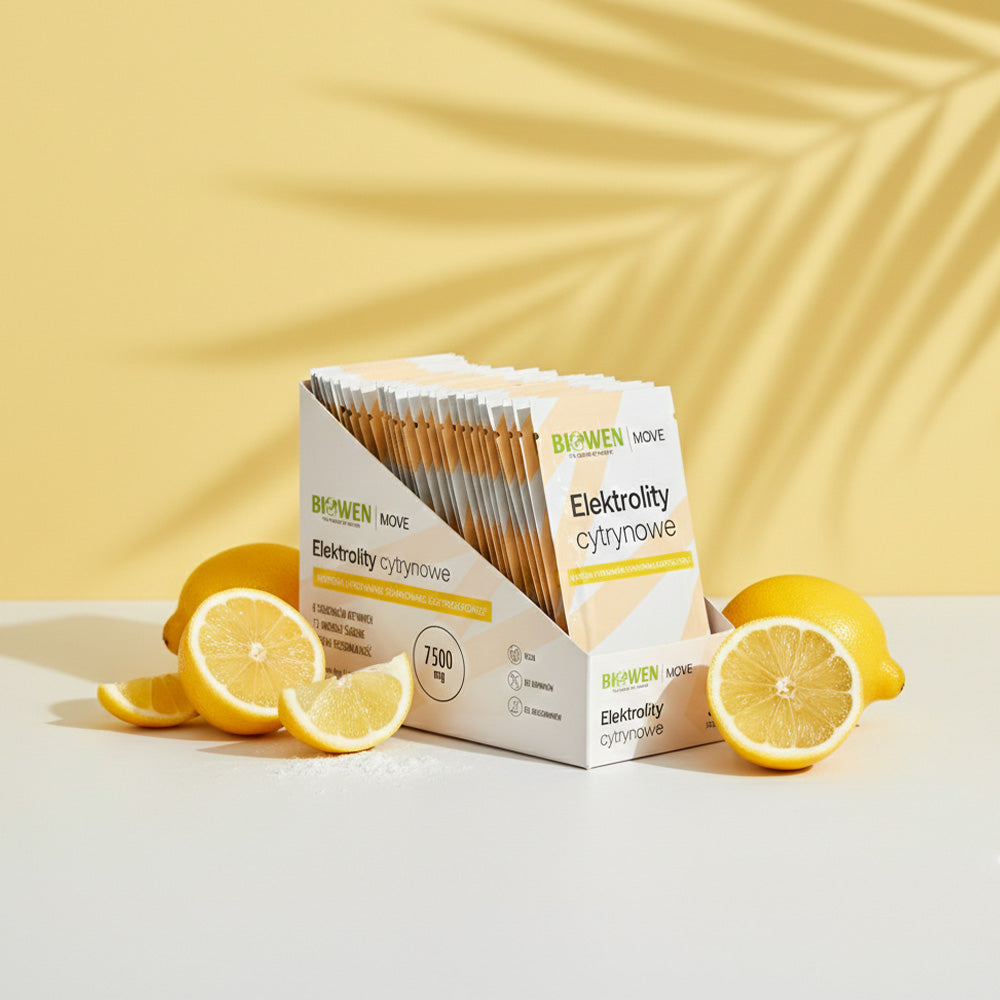 Opakowanie Elektrolity cytrynowe Biowen w saszetkach z cytrynami na jasnej powierzchni na tle żółtego tła