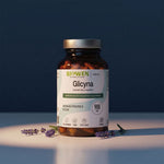 Glicyna Biowen 900 mg, suplement diety w kapsułkach, opakowanie 100 kapsułek na ciemnym tle z gałązkami lawendy