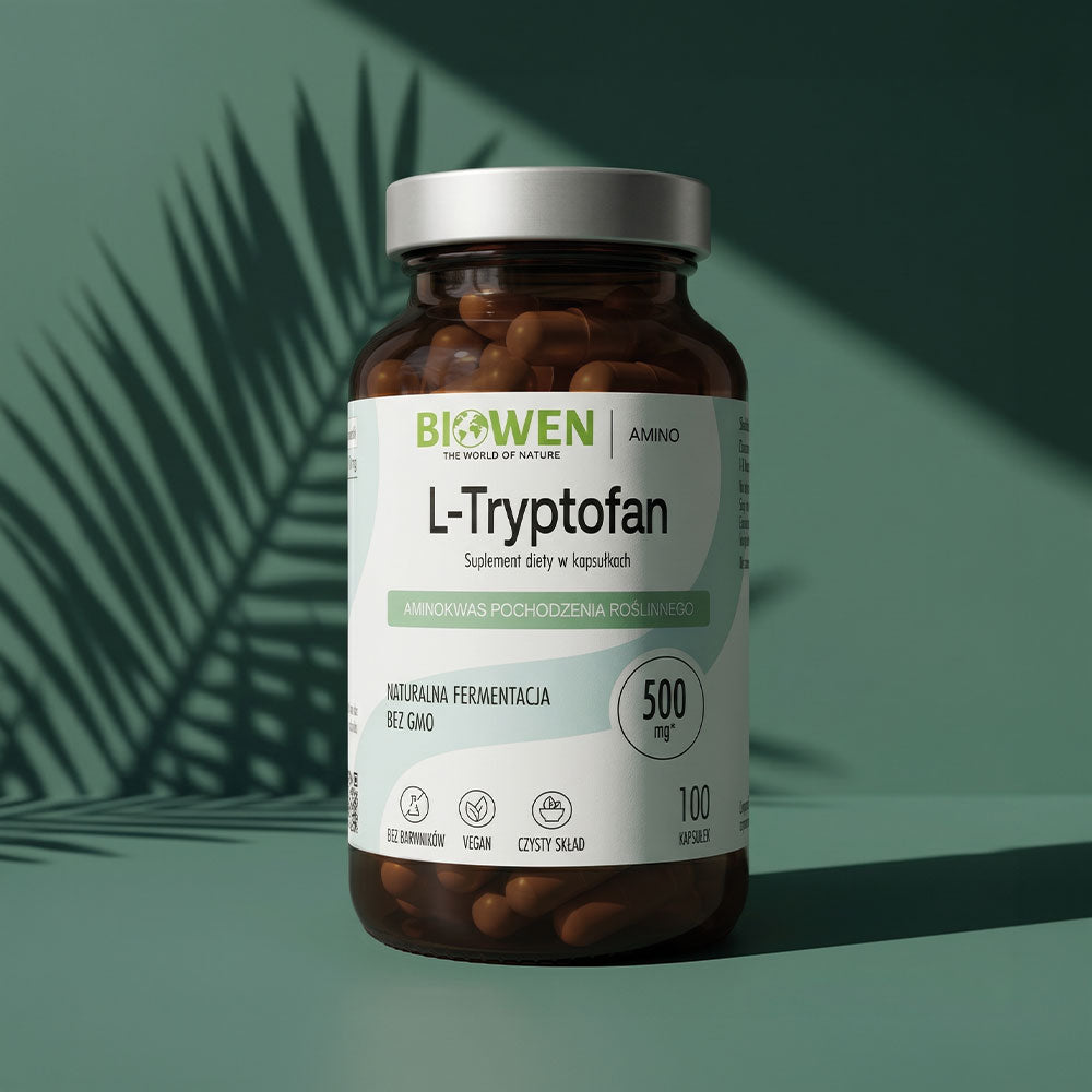 L-Tryptofan Biowen 500 mg w kapsułkach w szklanym opakowaniu na zielonym tle z cieniem liści palmowych