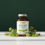 Słoiczek suplementu Rhodiola Rosea (różeniec górski) Biowen 60 kapsułek otoczony kwiatami różeńca.