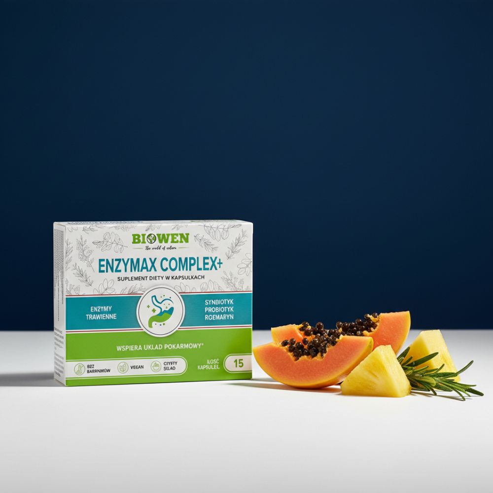 Opakowanie suplementu EnzyMax Complex+ Biowen 15 kapsułek obok kawałków papai, ananasa i gałązki rozmarynu.