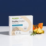 EnzyMax Complex+ Biowen w kapsułkach obok papai, ananasa i rozmarynu.